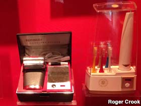 Display of gift razor and electric toothbrush for Johnson friends and dignitaries.
