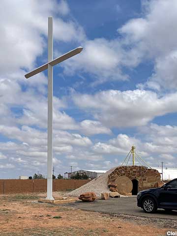 Cross and tomb.