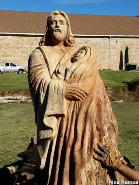 Carved stump Jesus.
