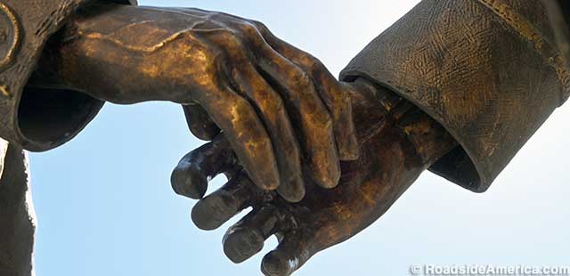 Statue handshake between Pancho Villa and John Pershing. Note the telltale finger curl.