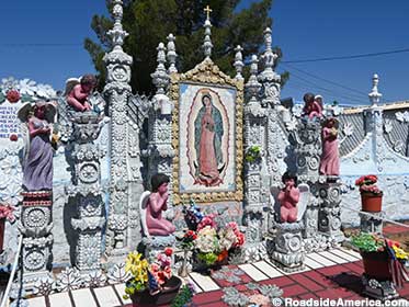 Virgin of Guadalupe shrine faces the adjacent freeway.