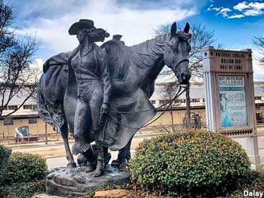 Cowgirl statue.