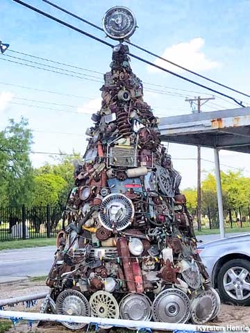 Auto Parts Christmas Tree with hubcap star.