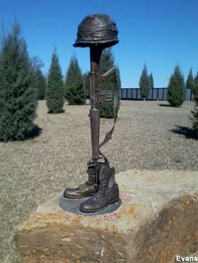 Fallen soldier sculpture.