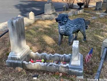 Dog Statue on Child's Grave.