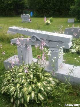 Clothespin grave monument.