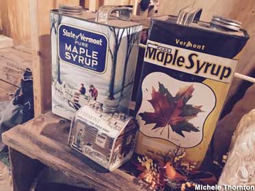 Cans of maple syrup.