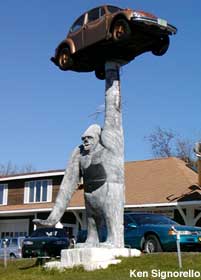 King Kong holding a Volkswagen beetle.