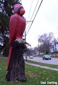 Carved Red Cardinal statue.