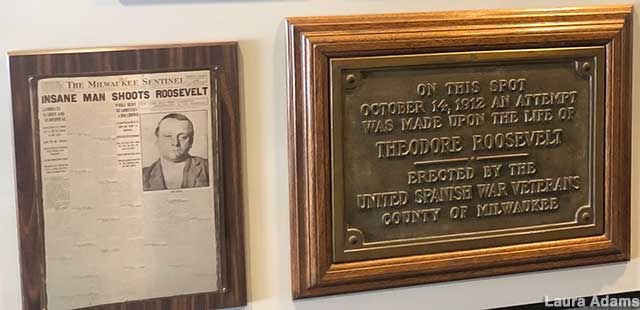 Newspaper and plaque.