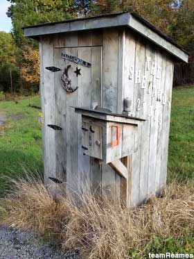 Outhouse mail box.