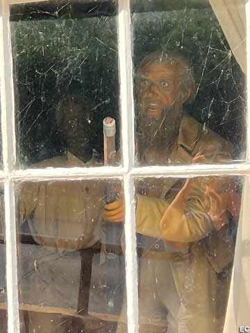 Wax John Brown in window.