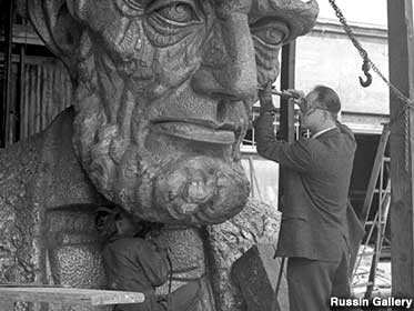 Robert Russin applies finishing touches to the head.