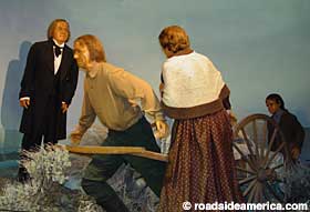 Mormon handcart and Brigham Young.