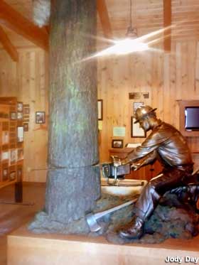 Sculpture of lumberjack.
