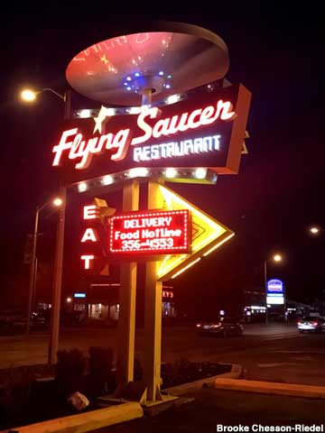 Flying Saucer Restaurant at night.